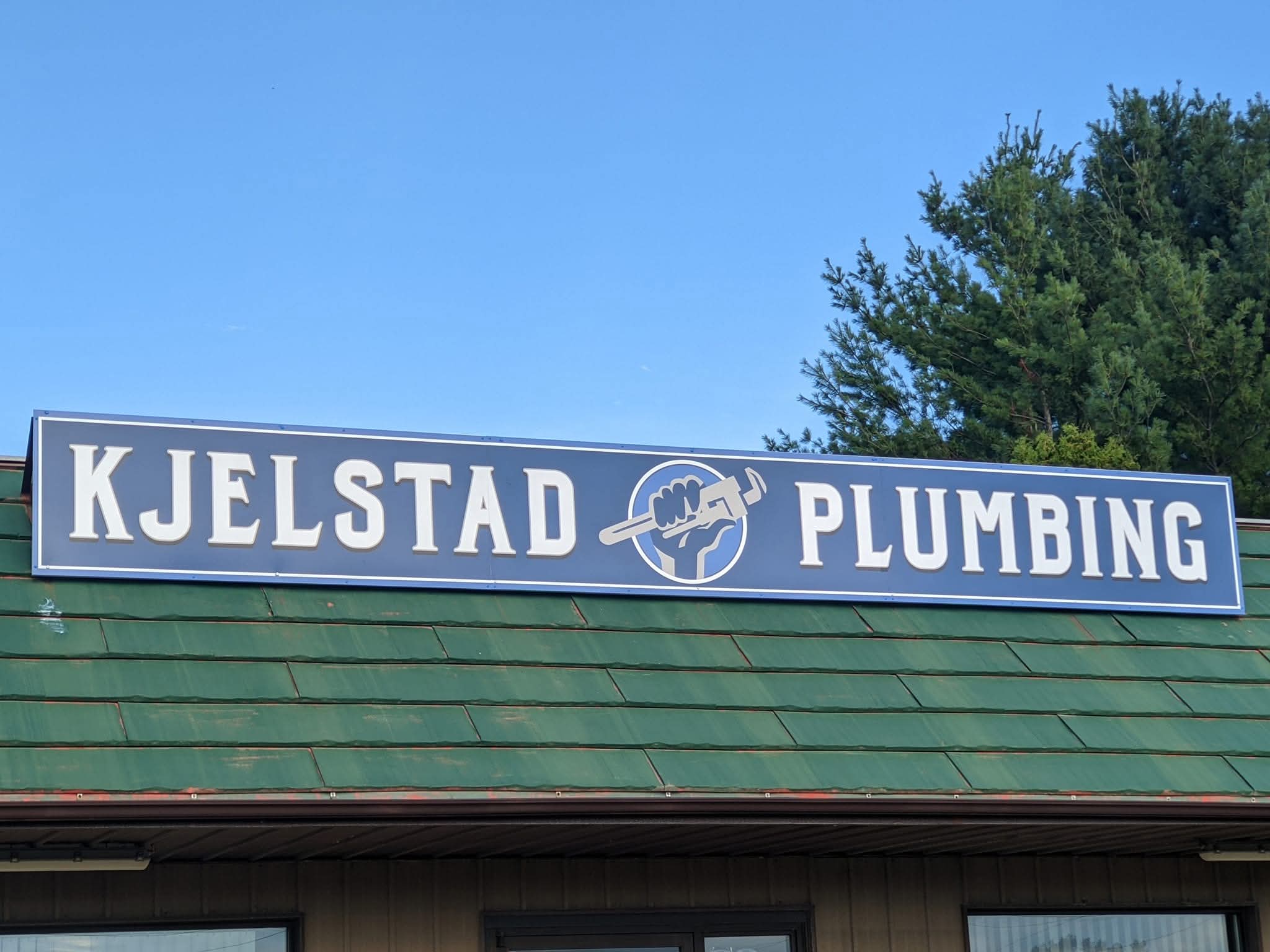 Kjelstad Plumbing building sign